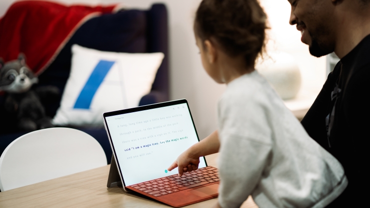 A Young Girl Using a Microsoft Surface Tablet