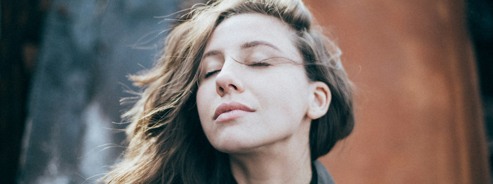 Woman taking a deep breath
