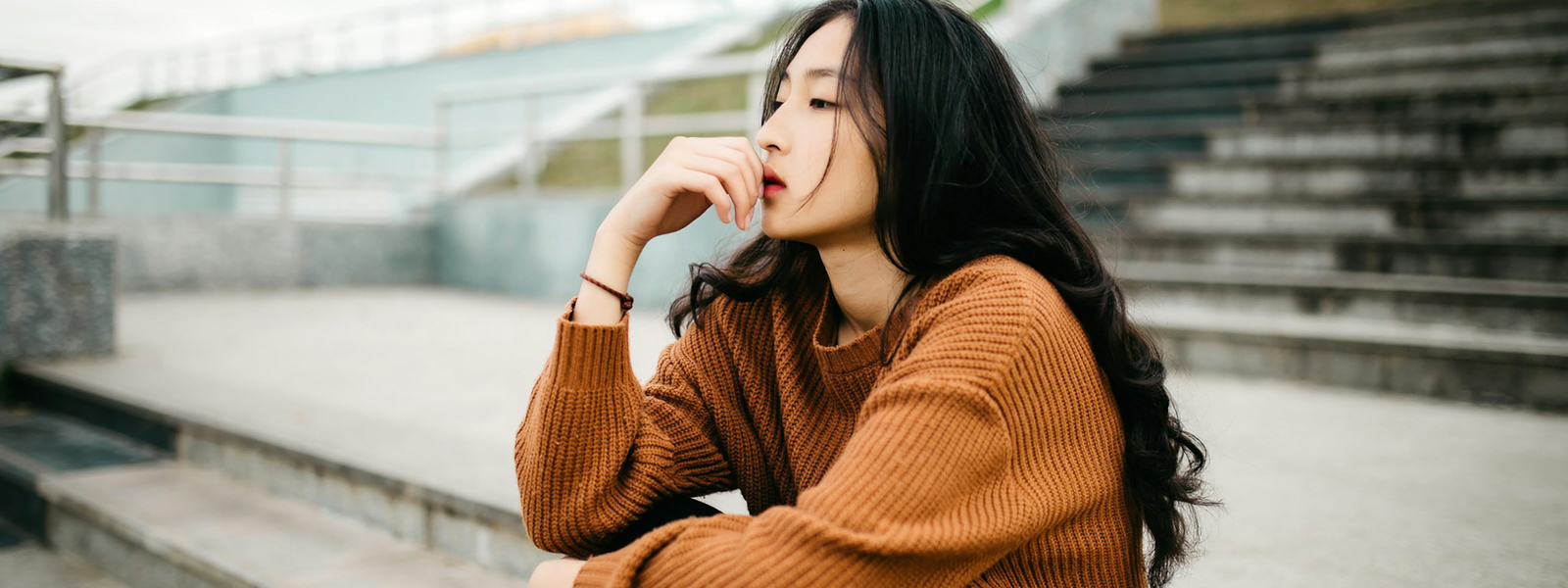 Woman sitting and thinking