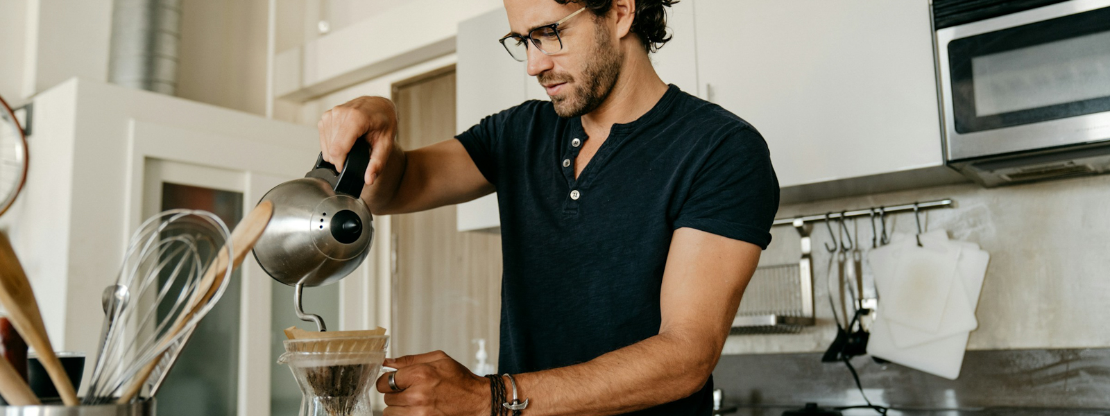 Man making coffee in the morning
