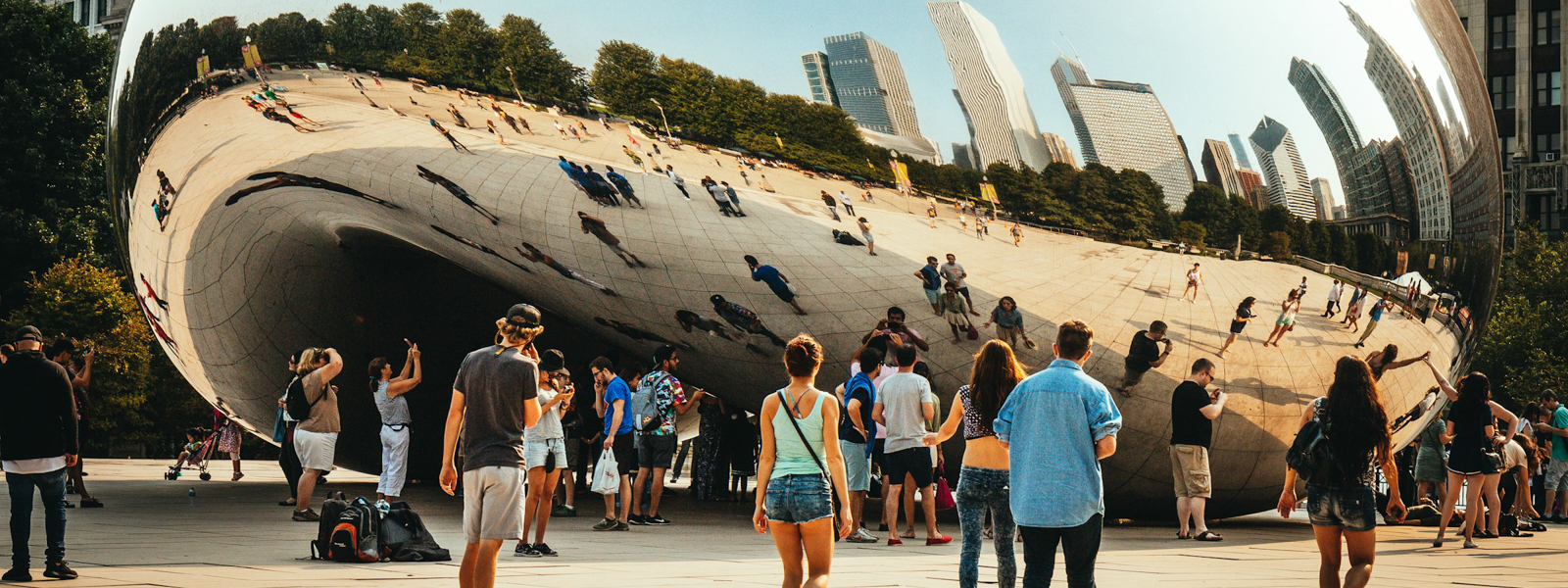 People in Chicago looking at The Bean