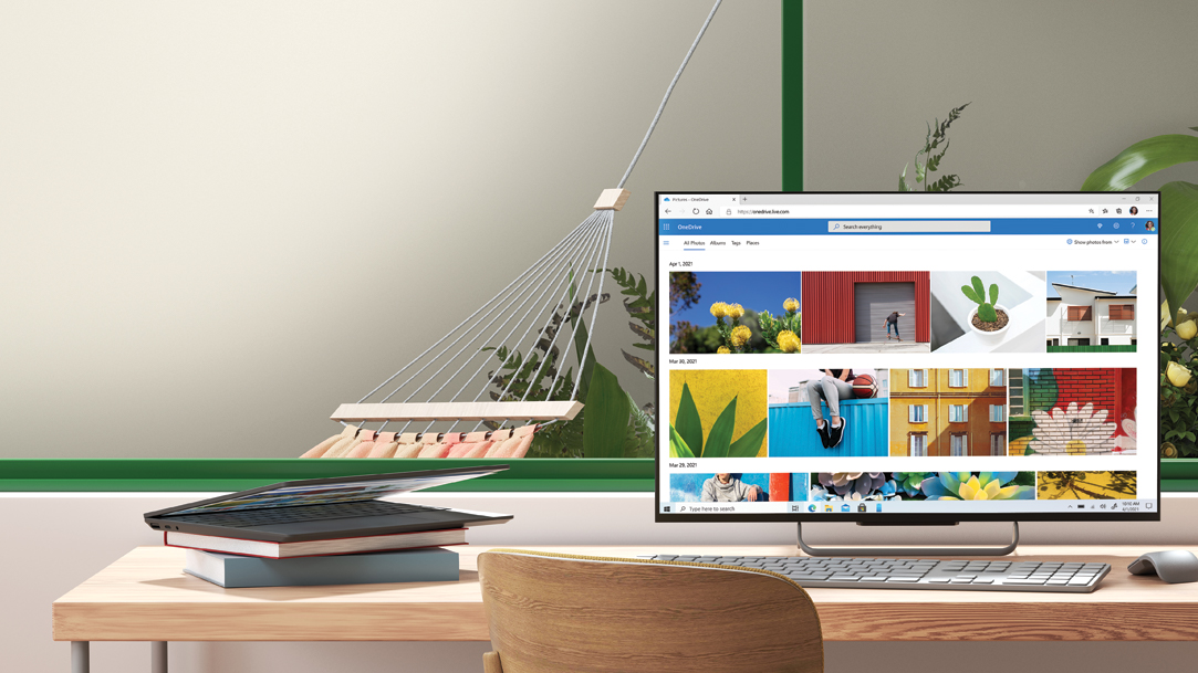 M365 OneDrive with photos on desktop monitor