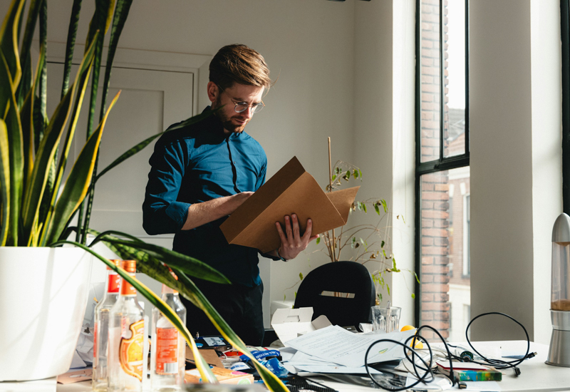 Busy man with accounting file